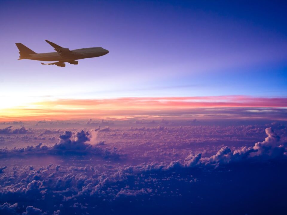 Orchestrating the Digital Future of Air Travel | Airplane at Sunset