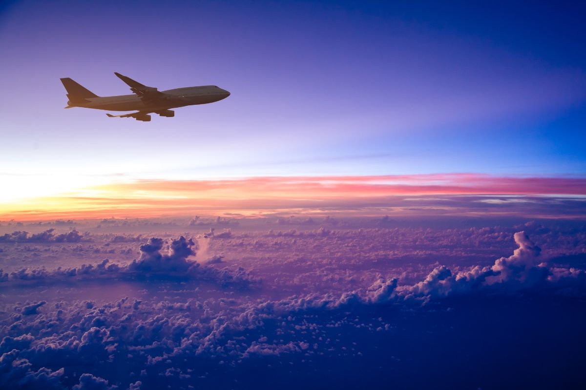 Orchestrating the Digital Future of Air Travel | Airplane at Sunset